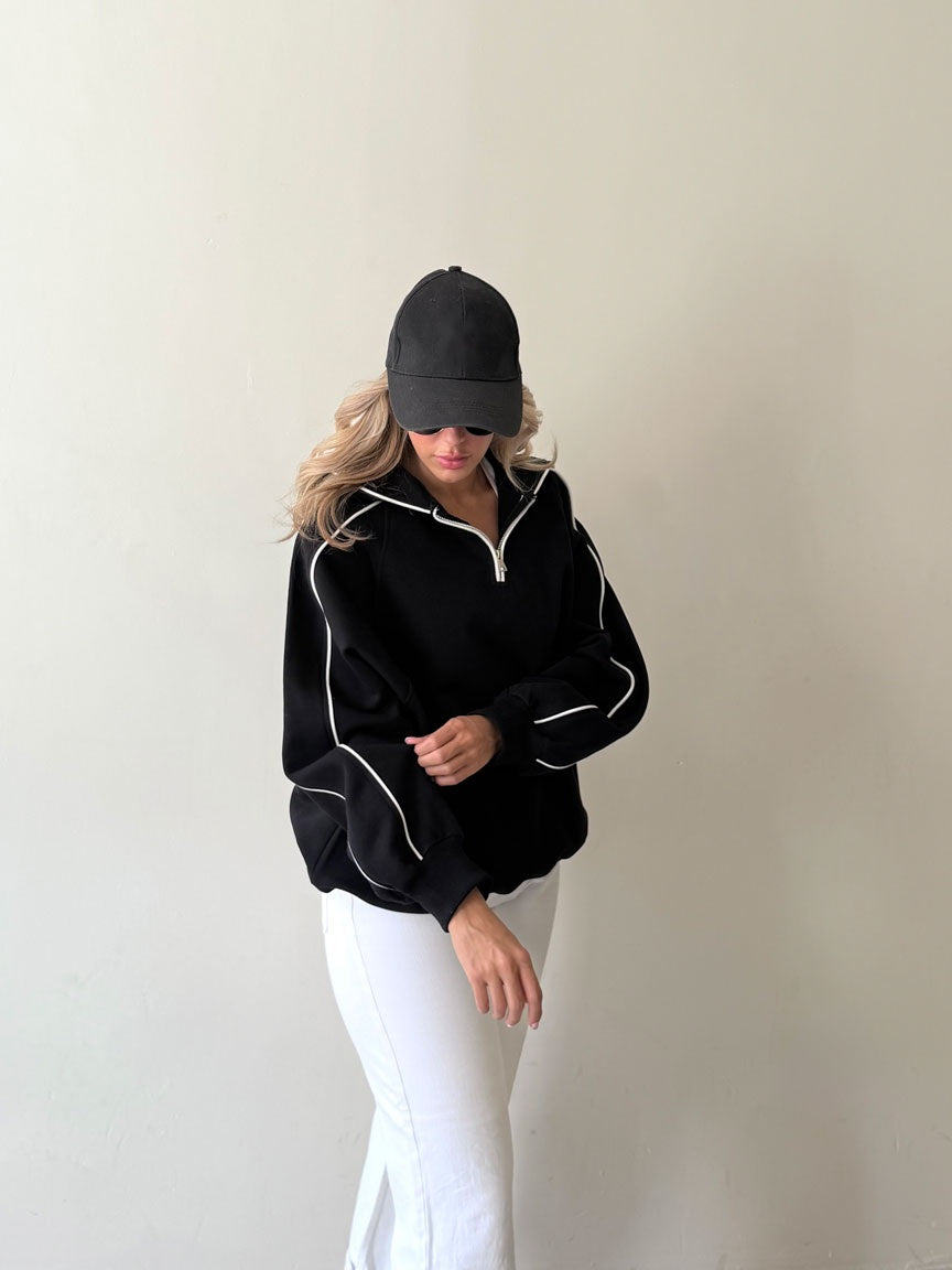 Sweat demi-zip noir à passepoil blanc, coupe oversize
